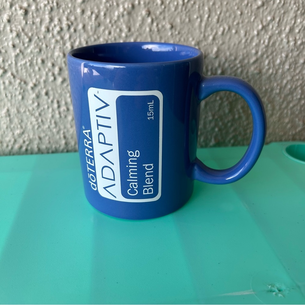 doterra adaptiv coffee mug blue and white looks like the label on an oil bottle
